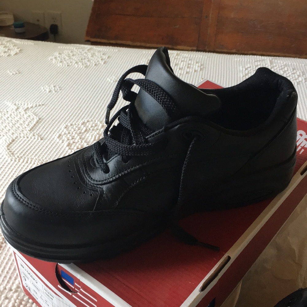 Women’s New Balance black walking/work shoe.
